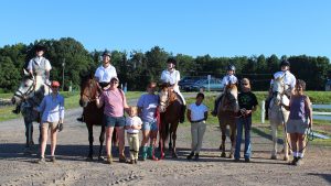 TRAV-Therapeutic Riding Association of Virginia group of people and horses